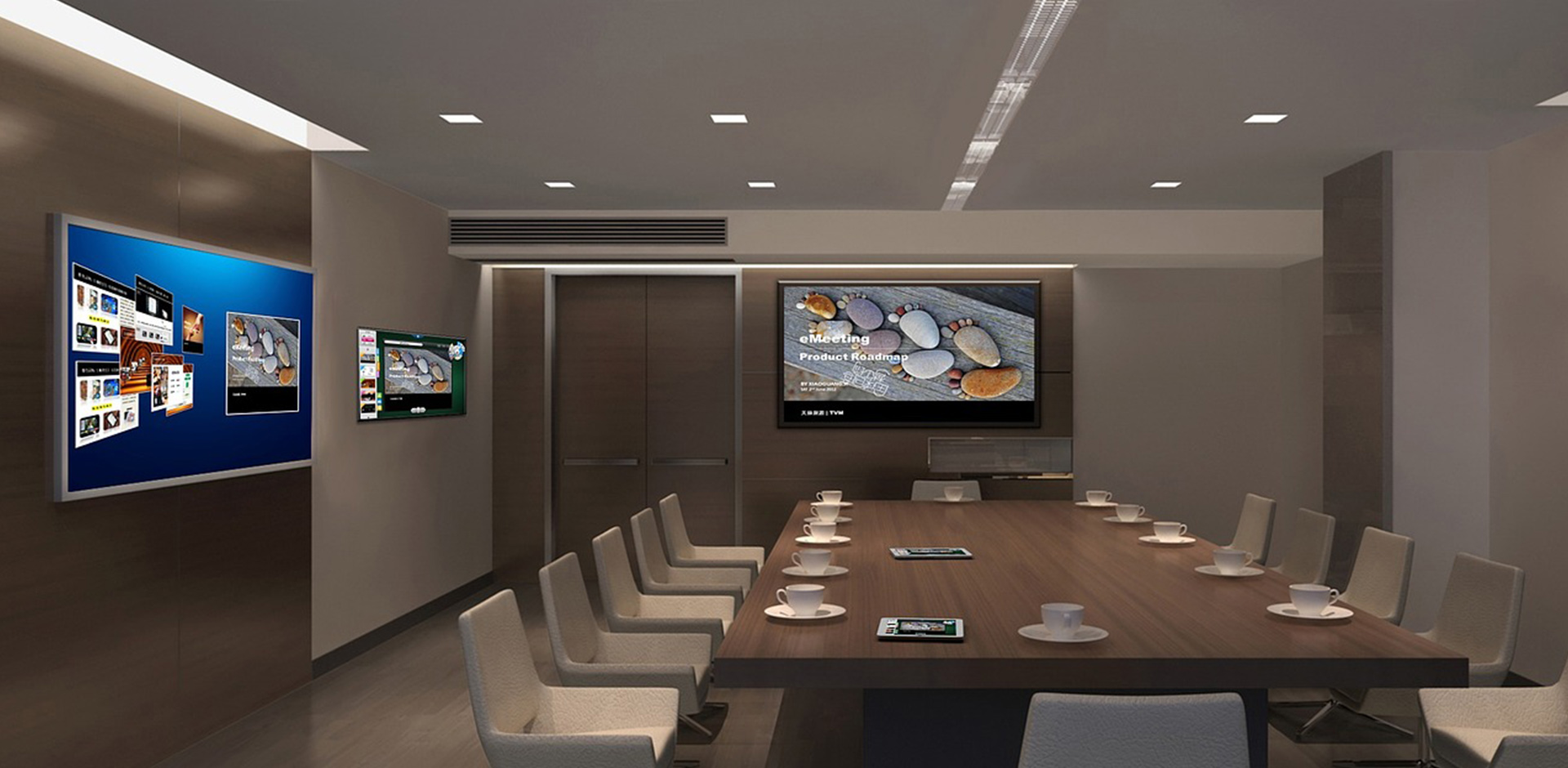 Meeting room with a long conference table and presentation screens