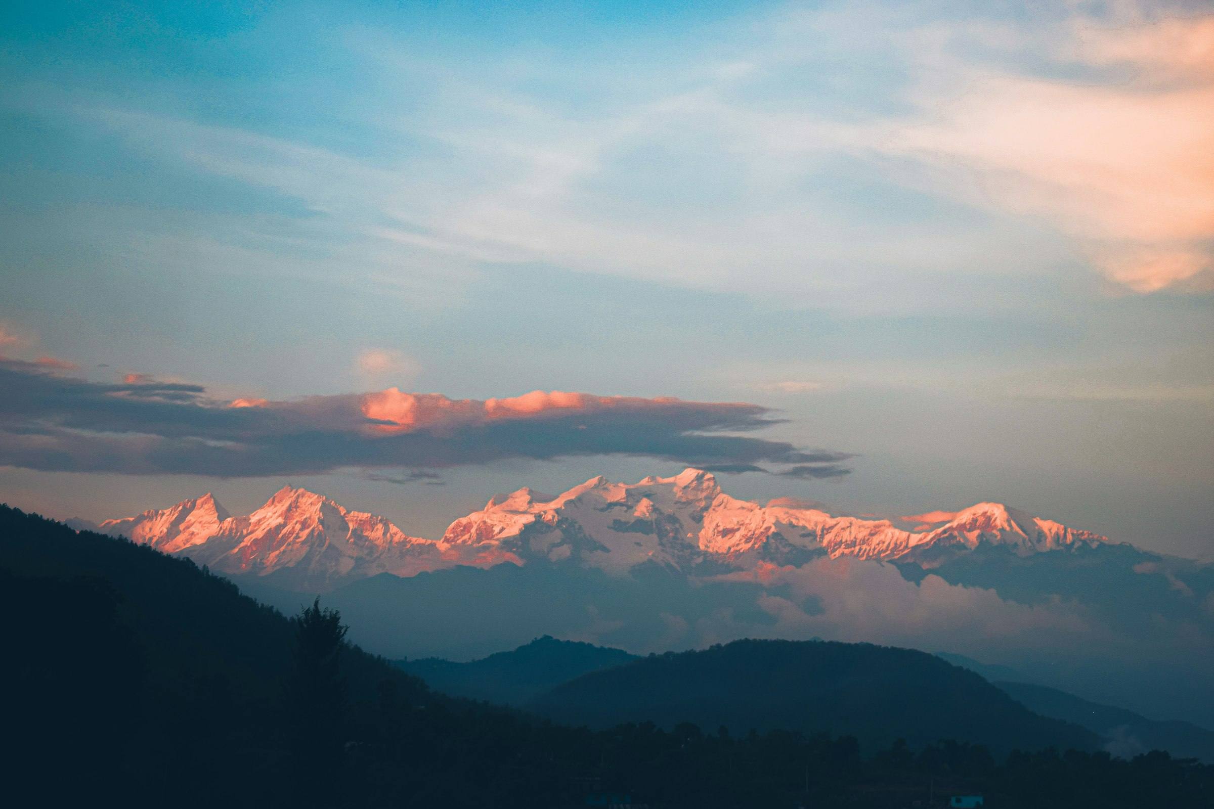 Himalayan peaks catching the last light at dusk